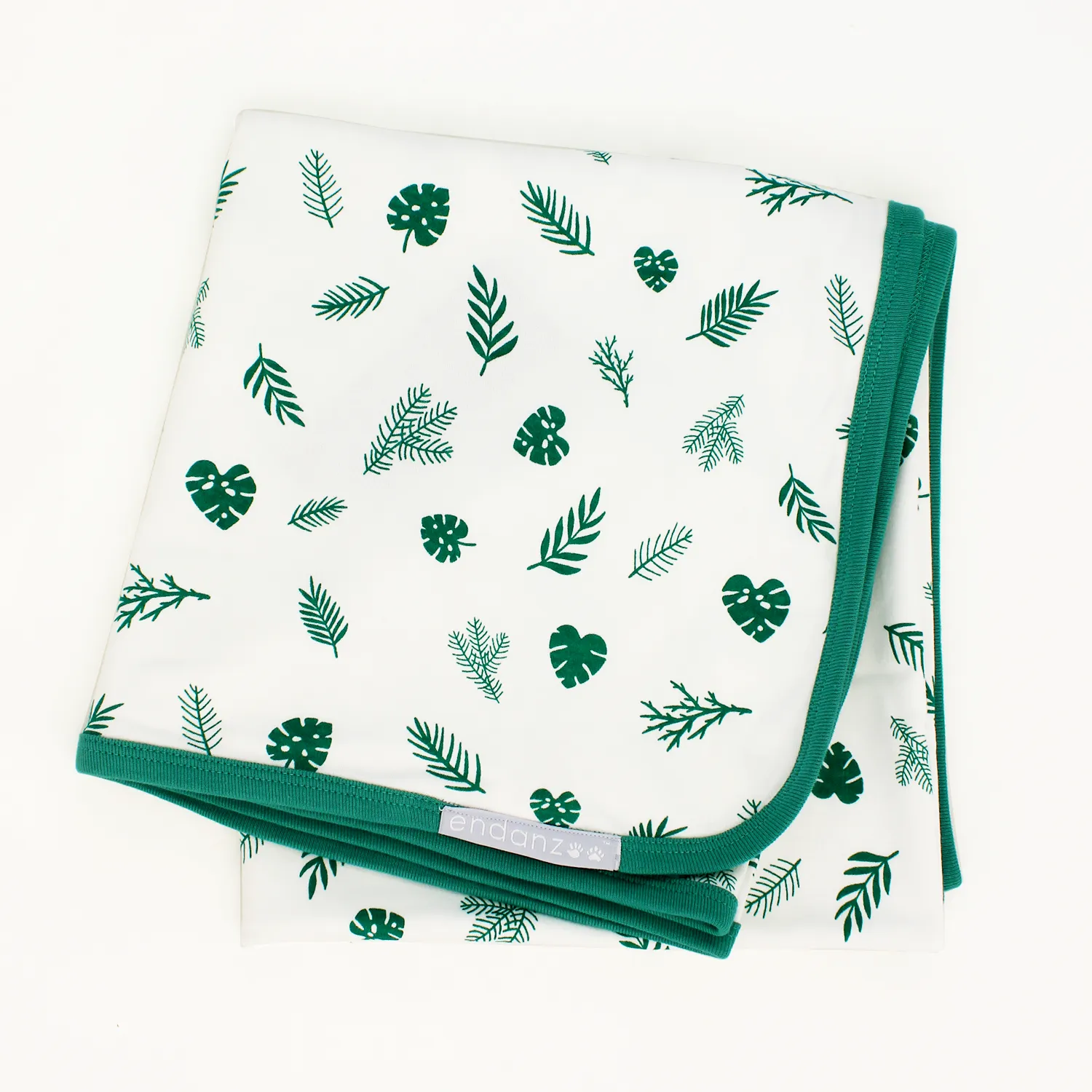 Wrapped with Endanzoo Organic Baby Swaddle Blanket - Tropical Leaves